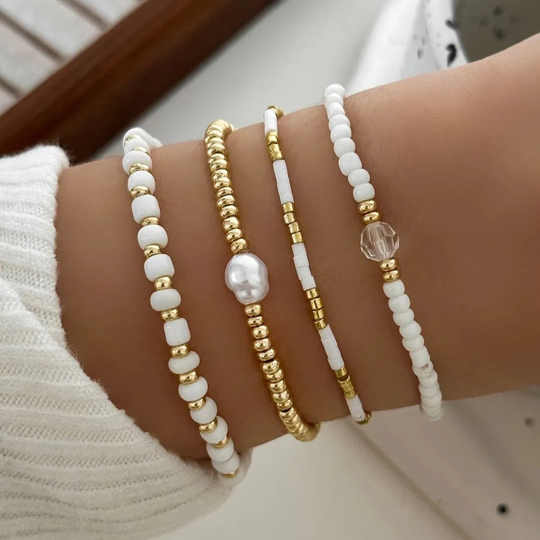Set de 4 Pulseras de Perlas en Tono Dorado