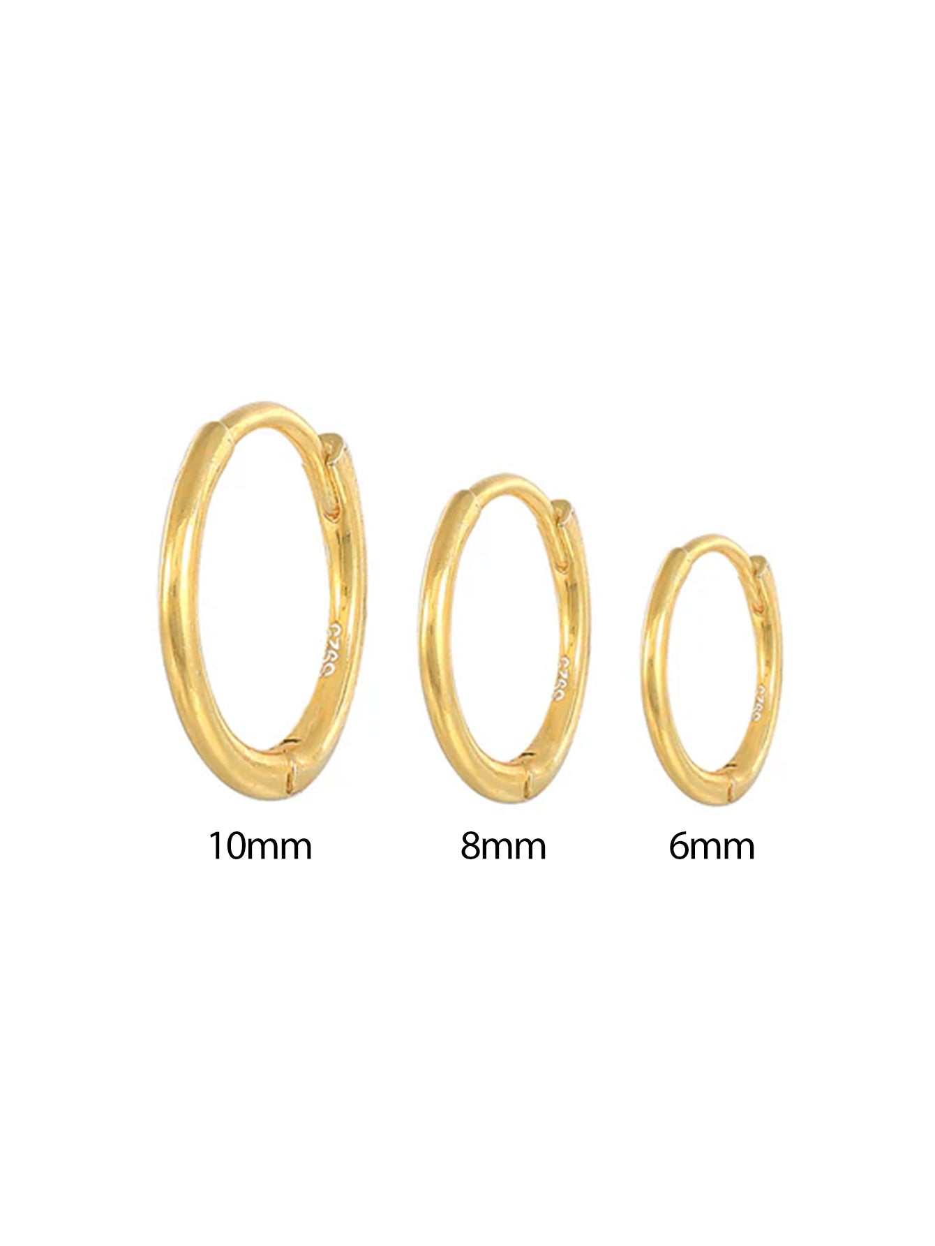 Emilie – Pendientes finos de oro con un brillo sutil.