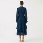 Mariana | Vestido Plisado con Mangas Fluidas y Volantes Asimétricos