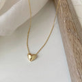 Klara – Collana dorata con pendente circolare