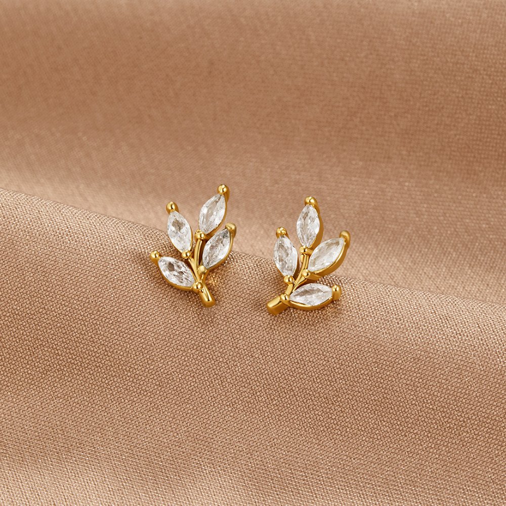 Felicita – Pendientes de oro con diseño de hoja.