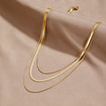 Antonie – Collana multistrato dorata con design elegante