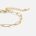 Pulsera de oro adornada con perlas